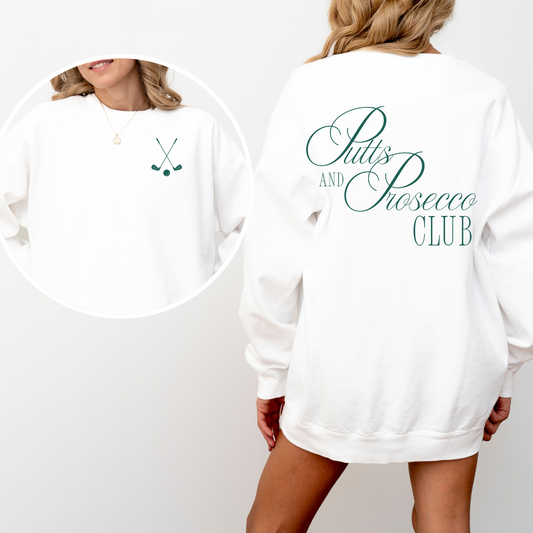 Unisex Comfort Colors sweatshirt with “Puts and Prosecco Club” in vintage style print on the back and crossed golf clubs on the front pocket