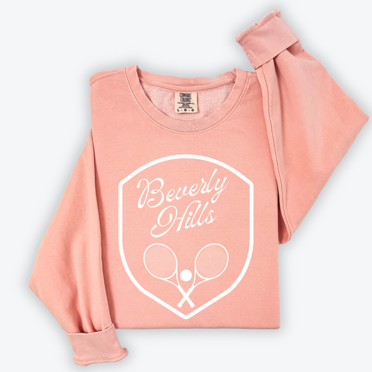 Lightweight cotton crewneck sweatshirt featuring a vintage tennis design and Beverly Hills lettering with old money country club vibes, ideal for casual wear and tennis enthusiasts.