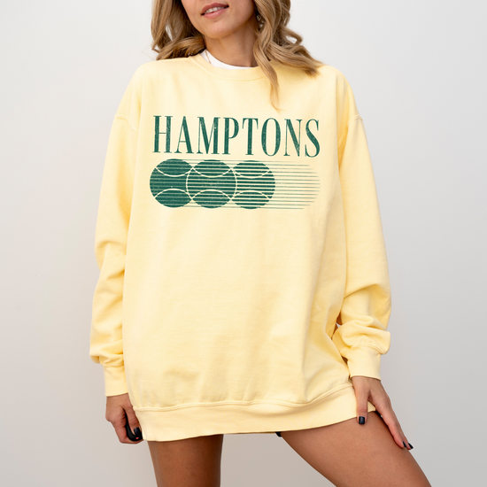 Lightweight cotton crewneck sweatshirt with "Hamptons Golf Club" in vintage retro style, perfect for layering, featuring classic coastal golf vibes and relaxed sophistication.