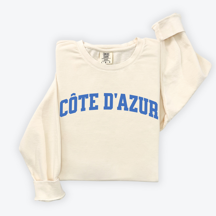 Côte d'Azur Comfort Colors lightweight cotton crewneck sweatshirt in a simple, sporty university font, perfect for travel days with a relaxed and comfortable fit.