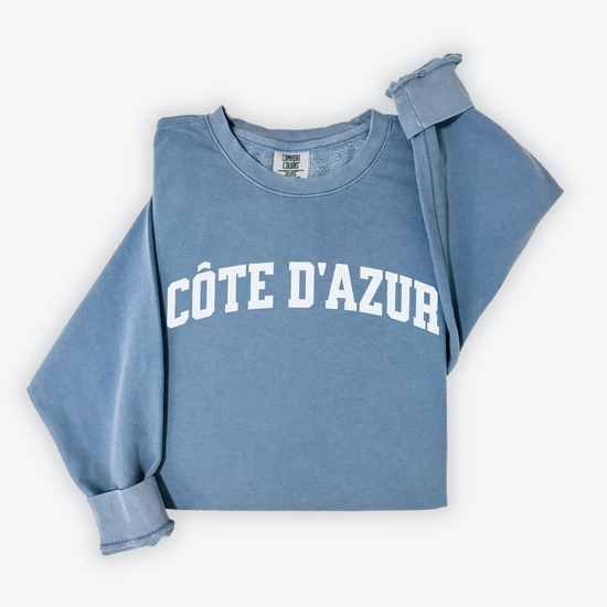 Côte d'Azur Comfort Colors lightweight cotton crewneck sweatshirt in a simple, sporty university font, perfect for travel days with a relaxed and comfortable fit.
