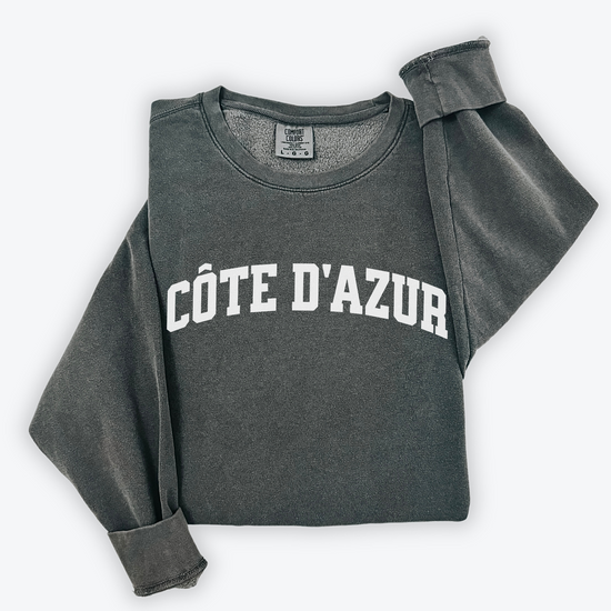 Côte d'Azur Comfort Colors lightweight cotton crewneck sweatshirt in a simple, sporty university font, perfect for travel days with a relaxed and comfortable fit.